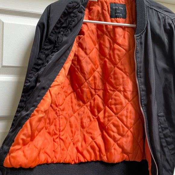 Black & Orange bomber jacket with gold rose zippers. - Picture 2 of 4